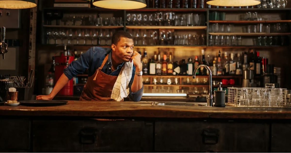 Restaurant owner at the POS counter